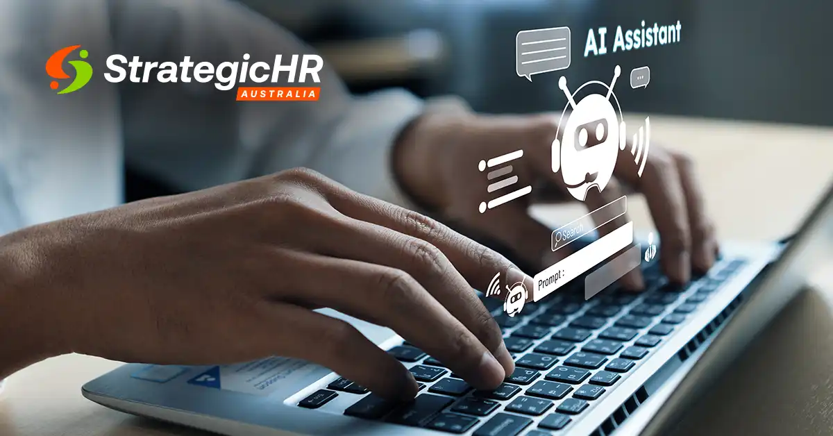 A person types on a laptop keyboard with digital graphics of an AI assistant and chat bubbles. The StrategicHR Australia logo is visible in the background.